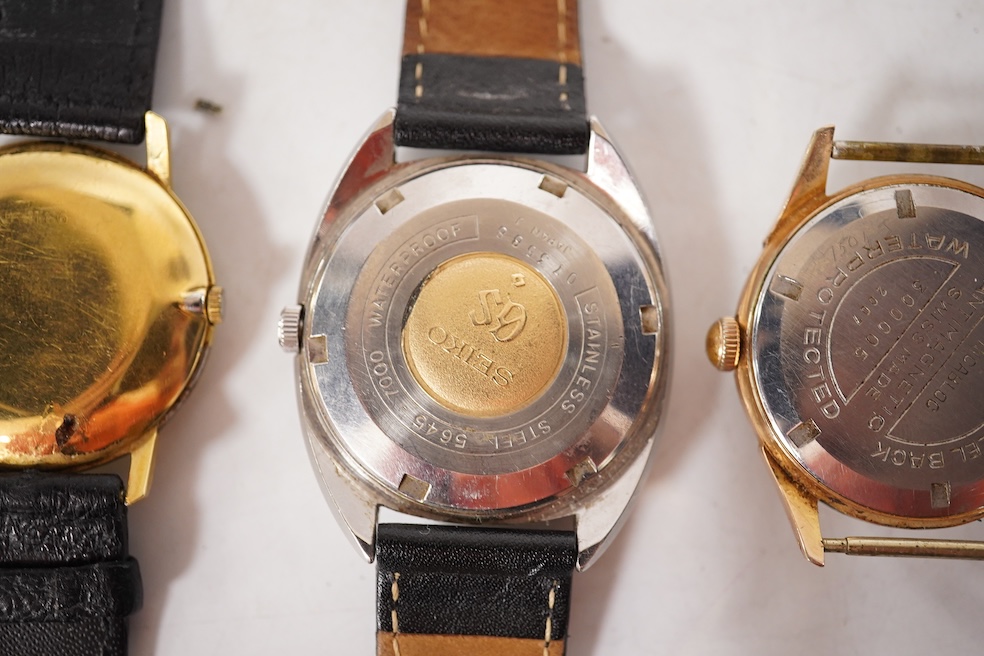 A gentleman's 1940's 9ct gold manual wind wrist watch(a.f.), together with four other wrist watches including Seiko, gold plated Girard Perregaux and Baume & Mercier Baumatic. Condition - poor to fair